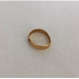 22ct wedding band, weight approx 2.3g - has been cut through.