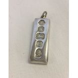 1977 silver jubillee ingot pendant with Sheffield hallmark. Total weight approx 31g.