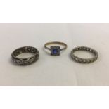 3 vintage ladies rings, 2 eternity rings (one with stone missing) and a dress ring with blue stone