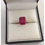 Ladies 9ct dress ring with large square cut created ruby. Size N.