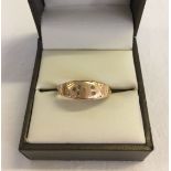 A 15ct gold gents signet ring set with 5 small diamonds. Total weight 1.7g approx. Size U.
