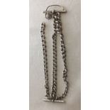 A silver 3 chain bracelet with T bar fastening a/f. Total weight 45.2g.