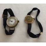 2 vintage ladies wrist watches with black ribbon straps. One with 9ct gold case and one with