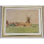 A framed and glazed watercolour signed T WAITS, possibly Cley Windmill. Approx 37 x 27cm.