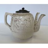 A Victorian creamware 2 spouted teapot with pewter lid. Repair to one spout.