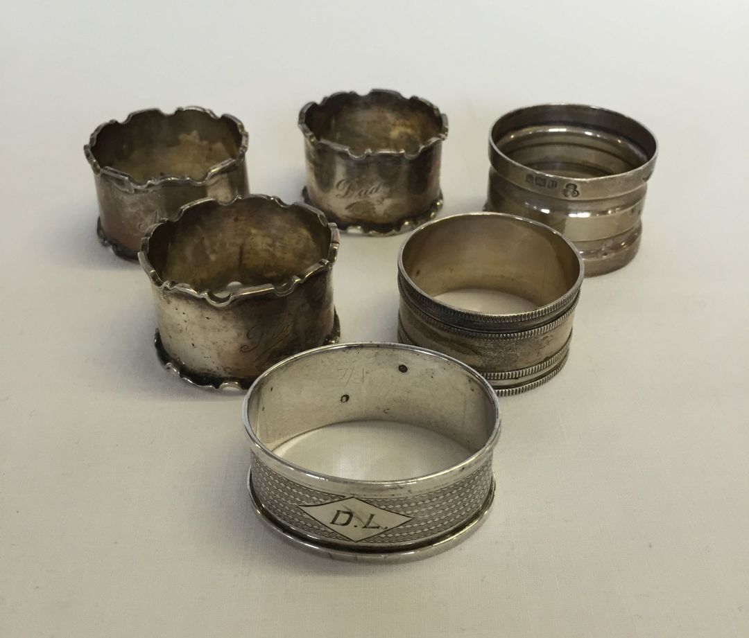 6 HM silver napkin rings - 3 matching design with names engraved and 3 others. Total weight approx