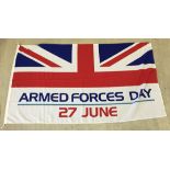 A flag commemorating Armed Forces Day 27 June.