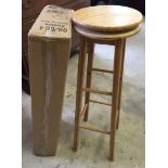 2 modern bamboo revolving stools, one new in box.