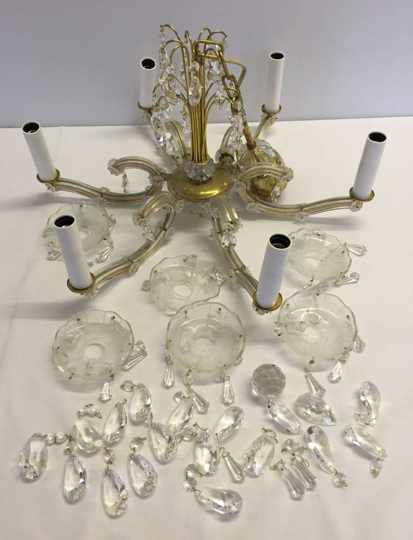 A 6 branch modern glass electric chandelier.
