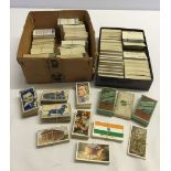 A collection of full and part sets of cigarette and trade cards.