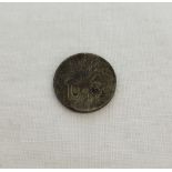 1 French IndoChina 10 cent coin. Dated 1939 with dot either side of date.