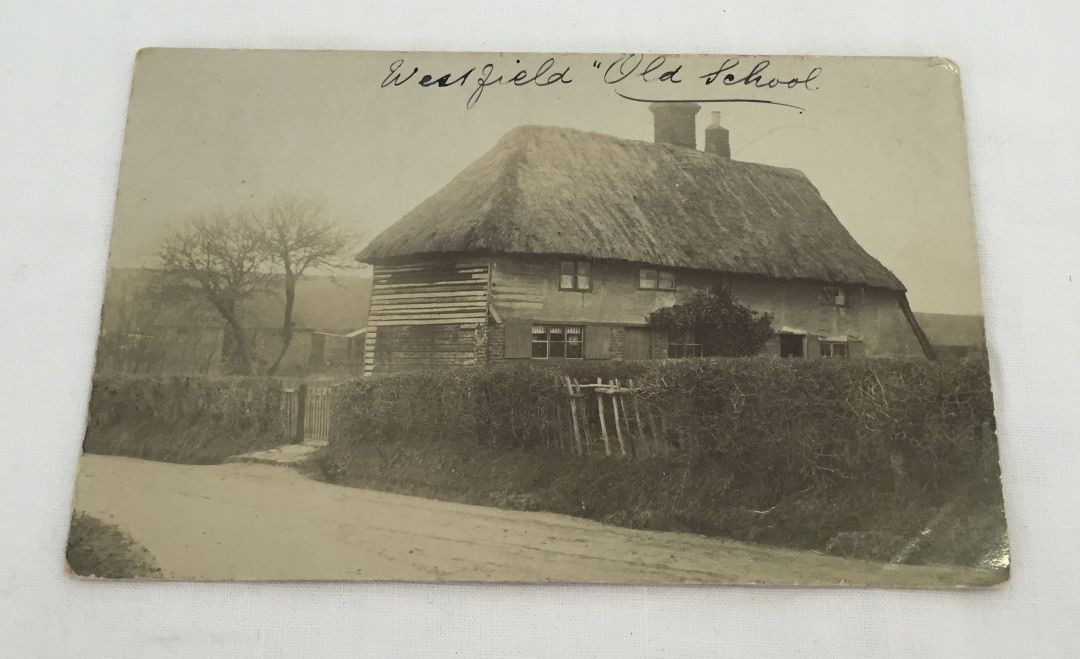 A photographic postcard of Westfield Old School believed to be in East Sussex