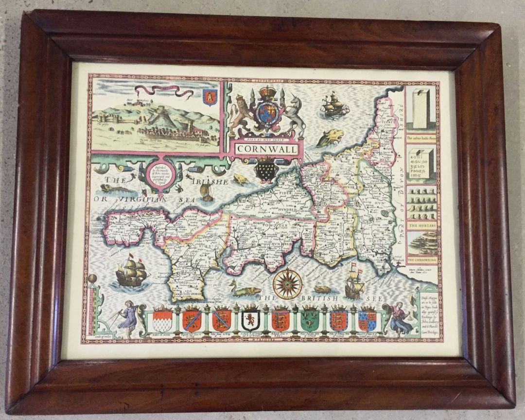 A framed and glazed colour reproduction map of Cornwall. 68 x 56cm.