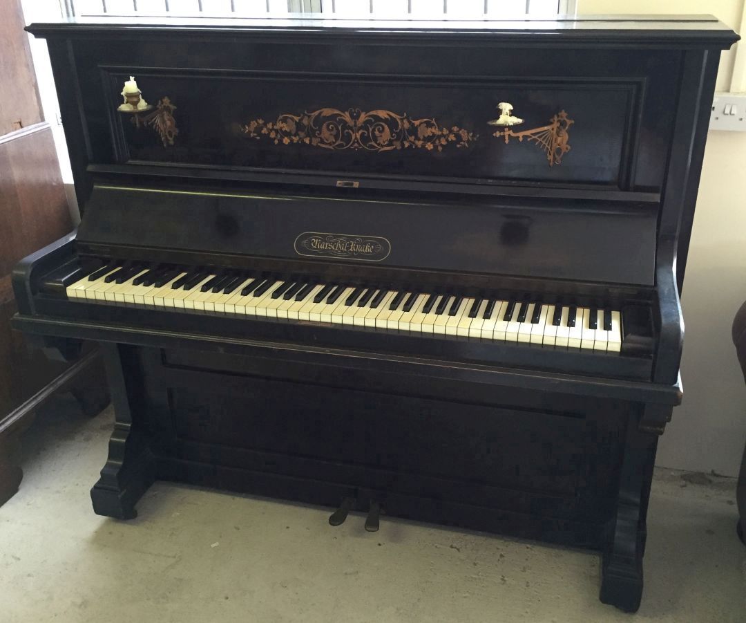 A Marschal Knake upright piano.