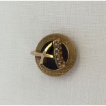 A 9ct gold vintage Avon 'Highest Honour' badge set with 5 tiny seed pearls. Approx weight 4.1g.