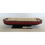 A wooden model of a barge 'Ambush'. 38cm long.