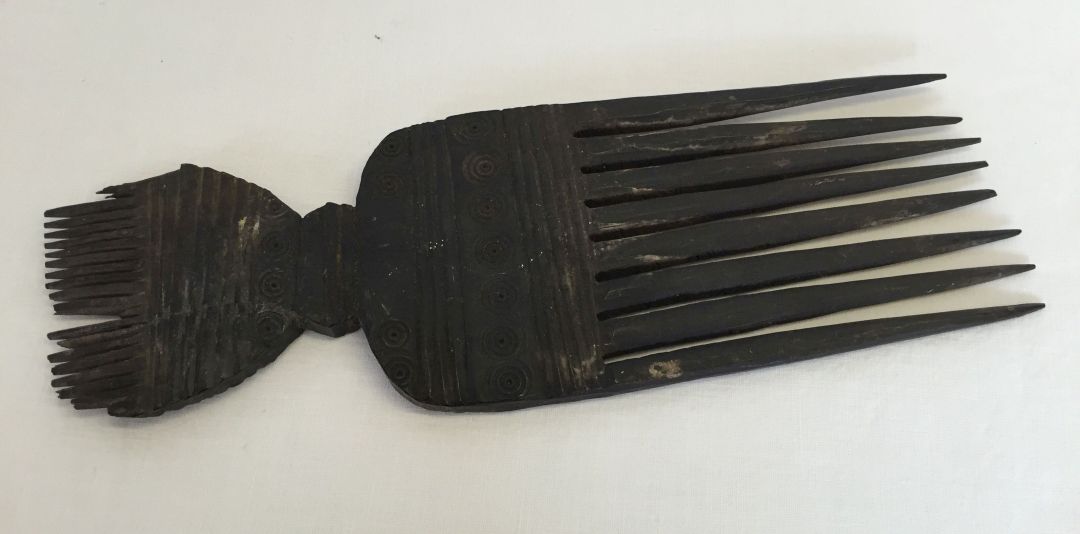 An African tribal head comb.