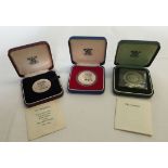 3 silver proof coins, all cased. St Helena Tercentenary 25 pence, The Queens Silver Wedding