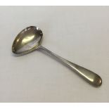 Silver childs pouring spoon. Hallmark Sheffield 1933. Maker Edwards Viner. Weight approx 21g.