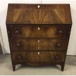 An Edwardian inlaid bureau with 3 drawers. Bone inserts to key and lock panels.