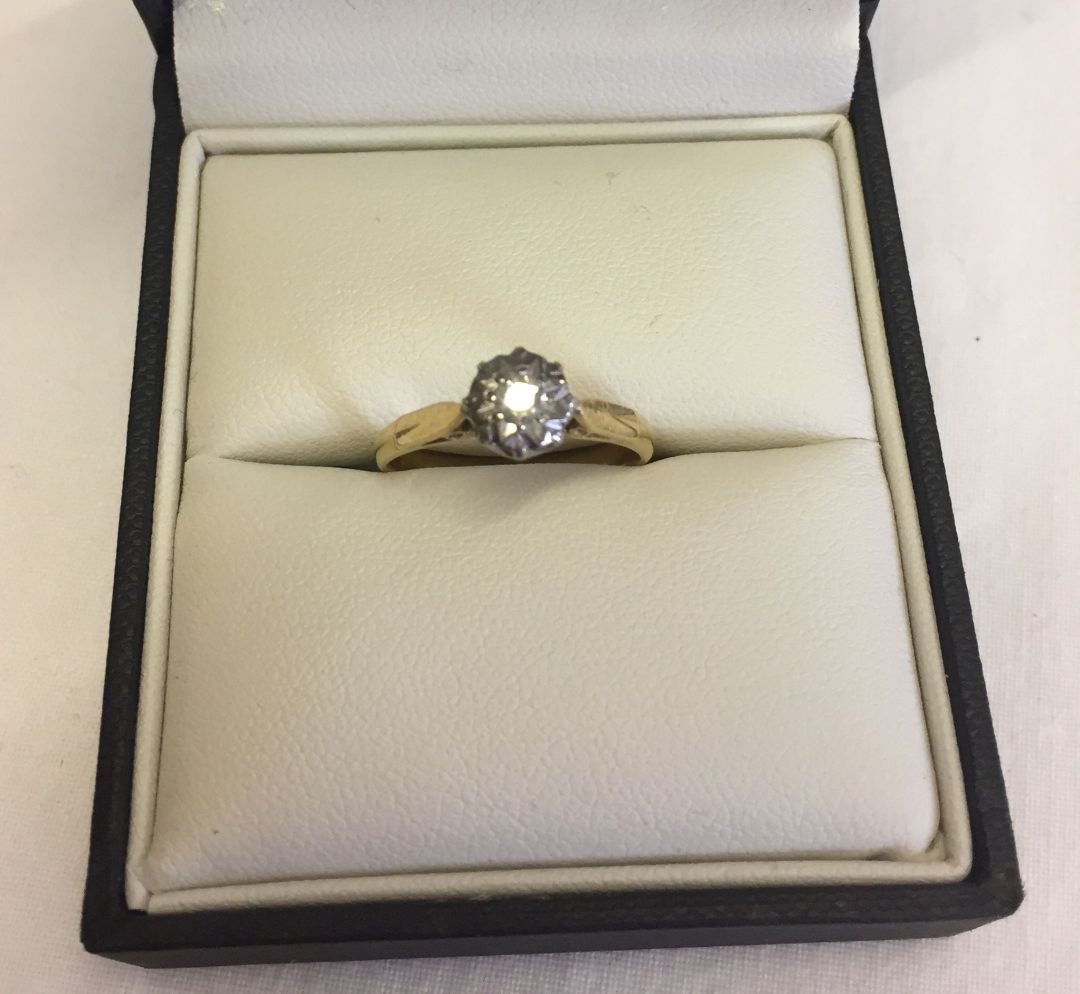 Gold and diamond solitaire ring size O. Small diamonds in an illusion setting. Hallmark rubbed. - Image 2 of 2