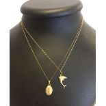 A 9ct gold small oval locket and a dolphin both on 9ct chains. Total weight approx 2.1g.