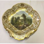 A hand painted Derby dish c1800 with 'In Germany' on reverse. Repairs to borders. 25cm diameter.