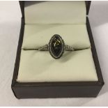 Silver ring set with amber. Size R.