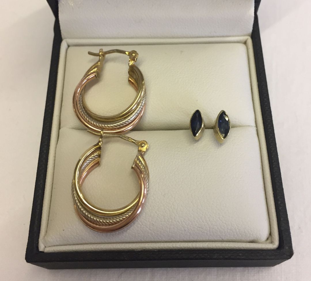 A pair of 9ct gold tri-colour hoop earrings weighing approx 2.2g, together with a pair of 9ct gold