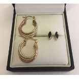 A pair of 9ct gold tri-colour hoop earrings weighing approx 2.2g, together with a pair of 9ct gold