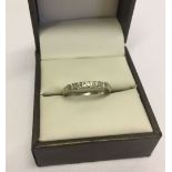 Hallmarked 9ct gold dress ring set with 5 small diamonds. Size N, total weight approx 2.3g.