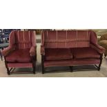 An early 20th century 2 seater wing back settee, oak framed and pink upholstery together with a