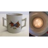 A small 3 handled commemorative mug with lithophane of Edward VII in base.