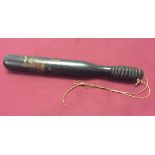An 1850s Victoria Police truncheon with ribbed handle and painted decoration approx 36cm.