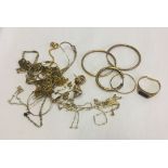 A bag of gold/yellow metal scrap jewellery. Weight approx 12g.
