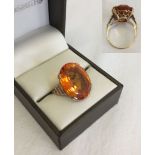 A large citrine 9ct gold ring, size P. Total weight approx 8g.