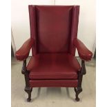 Late Victorian/Edwardian library chair upholstered in red leather. 75 x 108cm.