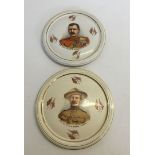 2 early 20th century military decorated ceramic wall hanging plaques, depicting portraits of R.S.