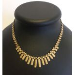 9ct gold Cleopatra design necklace. Weight approx 13g.