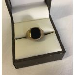 9ct gold signet ring set with black onyx. Size L, weight approx 2.7g.