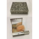 A silver combined powder compact lipstick and mirror. 50mm x 50mm x 20mm. Stamped .800 on inside.