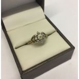 9ct gold cluster ring set with small diamonds. Size N, weight approx 1.8g.