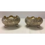 A pair of silver Indian bon bon dishes made to resemble an opening pond lily. Each leaf is