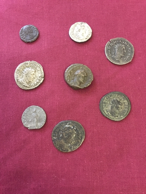 A quantity of antique hammered coins.