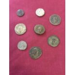 A quantity of antique hammered coins.