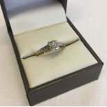 A vintage .10pt diamond ring set in 9ct gold. Size M. Total weight 2.2g.