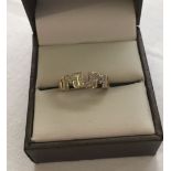9ct gold 'MUM' ring set with 3 small diamonds. Size M, weight approx 1.4g.