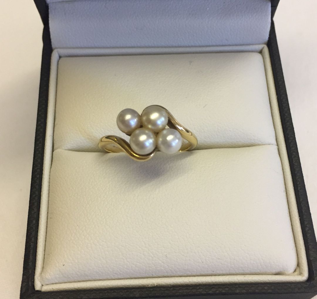 An 18ct gold and cultured pearl ring size P1/2. Total weight approx 4.1g. Tests as 18ct.
