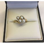 An 18ct gold and cultured pearl ring size P1/2. Total weight approx 4.1g. Tests as 18ct.