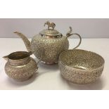 3 Indian silver items with matching engravings. 1) Jug with an upright Cobra handle. 80mm high,